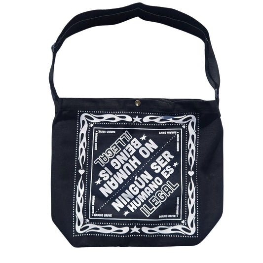 NO HUMAN BEING IS ILLEGAL Tote Bag