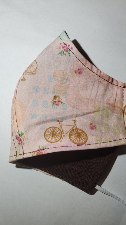 Pink floral bicycles face mask